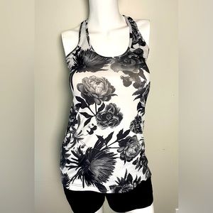 Lululemon Cool Razorback tank size 6 black and white flowers